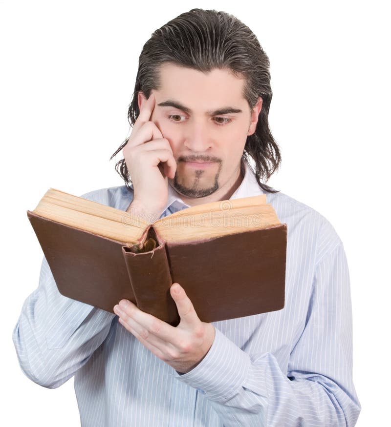 Young guy looks into book and thinks isolated