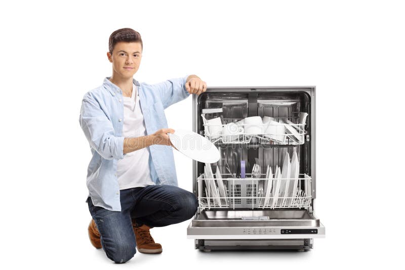 Young Guy Putting A Plate Into A Dishwasher Stock Image Image of