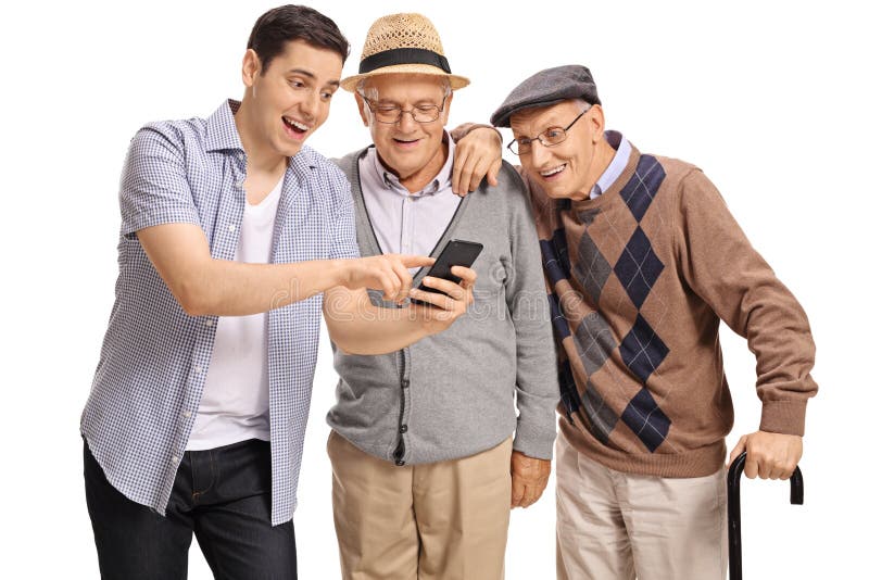 Young guy showing something on phone to two elderly men royalty free stock image Young guy showing something on phone to two elderly men royalty free stock image
