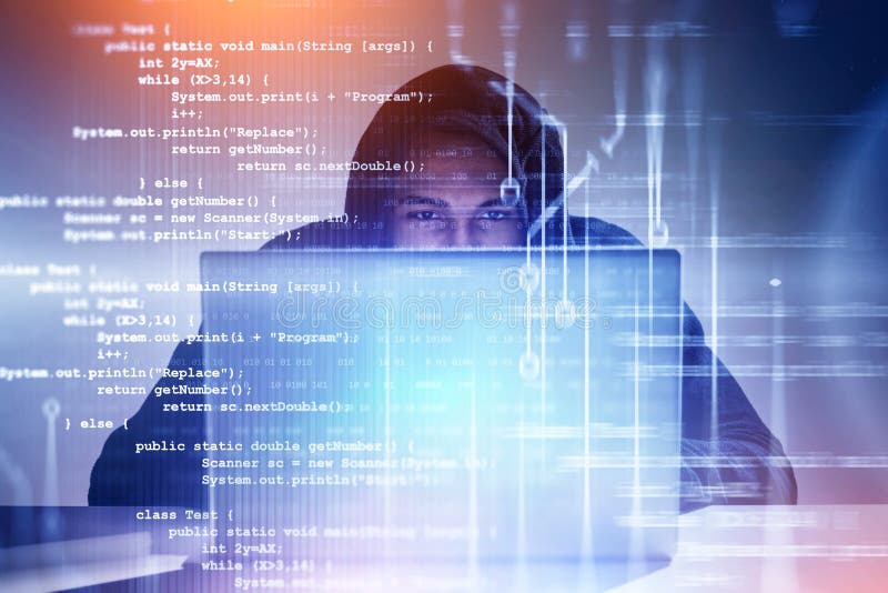 Young hacker working with laptop, code royalty free stock images