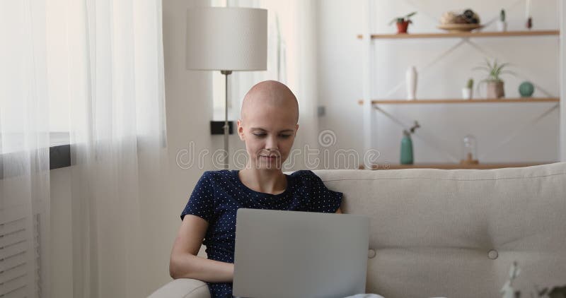 Young Hairless Cancer Treatment Center Female Patient Using Computer. Stock Footage - Video of patient, information: 204848340