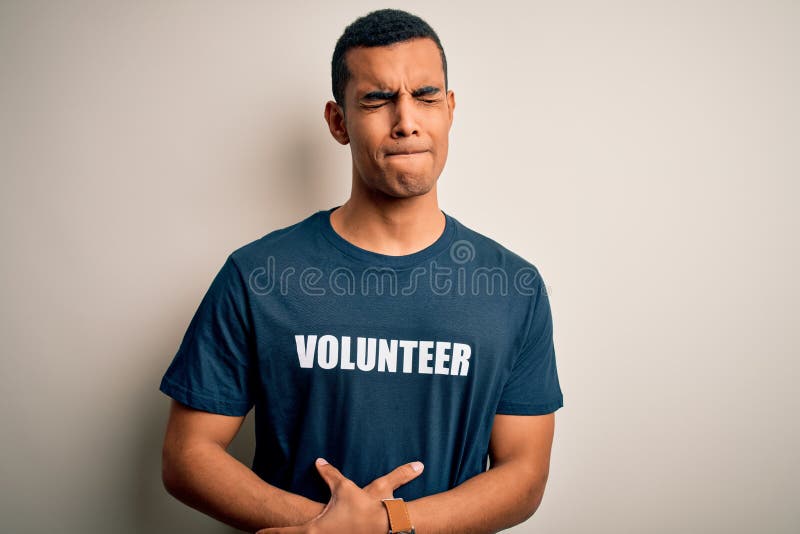 Young handsome african american man volunteering wearing t-shirt with volunteer message with hand on stomach because indigestion
