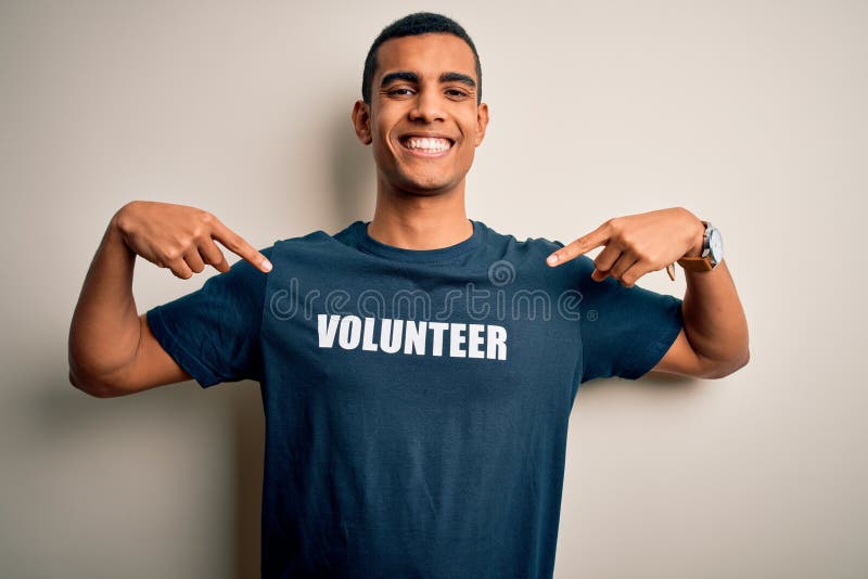 Young handsome african american man volunteering wearing t-shirt with volunteer message looking confident with smile on face