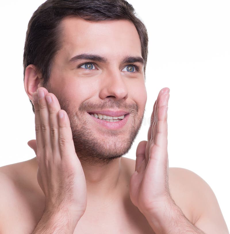 Young Handsome Man Applying Lotion. Stock Image Image of closeup