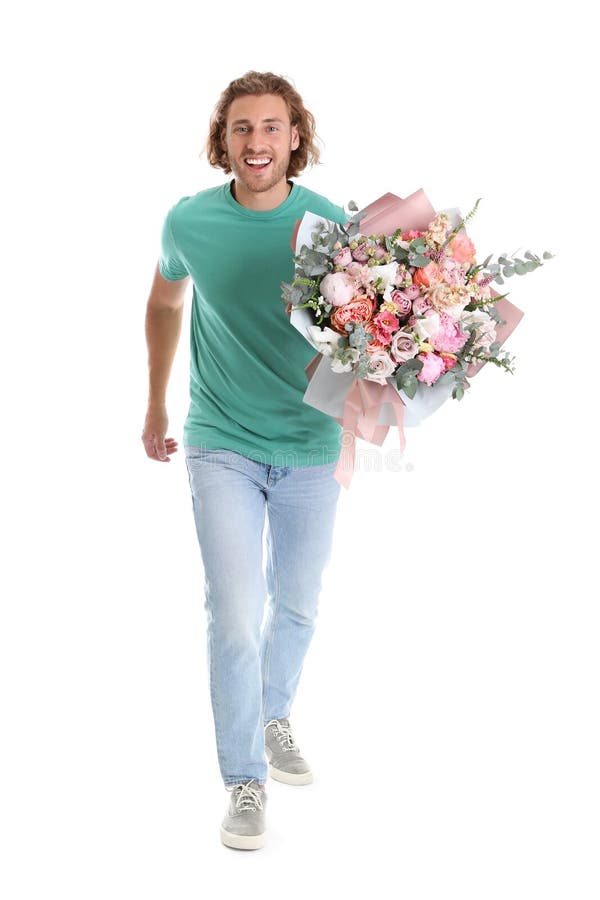 Young handsome man with beautiful flower bouquet