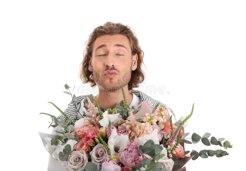 Young handsome man with beautiful flower bouquet