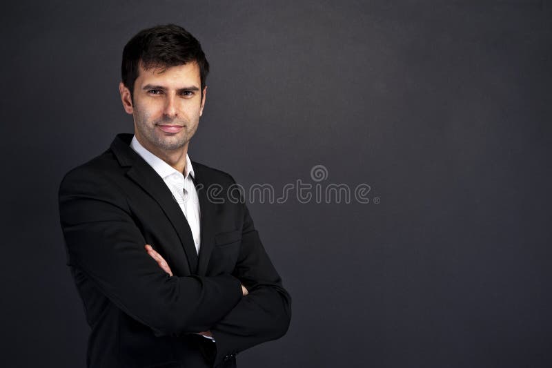 Young handsome man in black suit smiling royalty free stock photos Young handsome man in black suit smiling royalty free stock photos