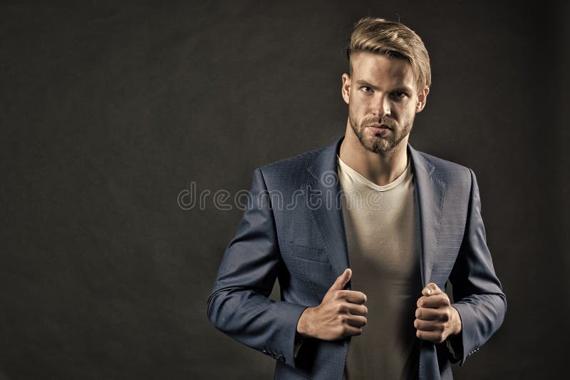 Young handsome man in blue suit royalty free stock photography Young handsome man in blue suit royalty free stock photography