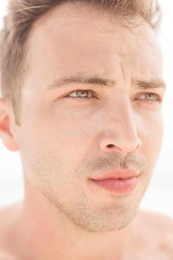 Young Handsome Man Looking Away from the Camera. Stock Photo Image of