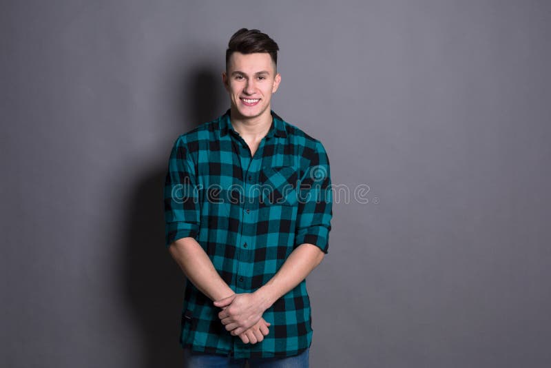 Young handsome man studio portrait, boy style stock image Young handsome man studio portrait, boy style stock image