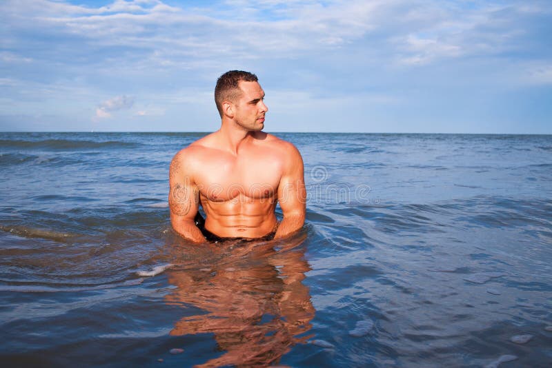 Young handsome muscular man stock image