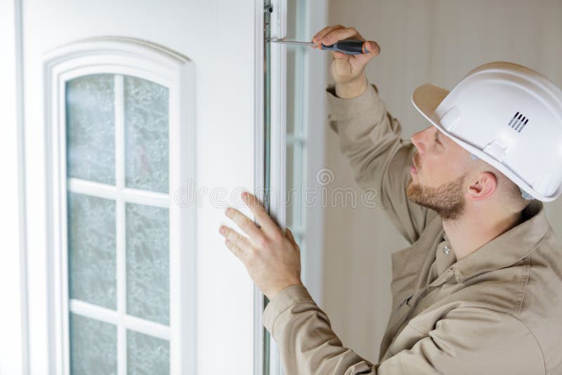 Young Handyman Repairs Window Stock Image Image of install, carpenter