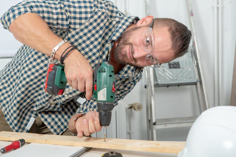 Young Handyman Using Electric Drill, DIY at Home Stock Image Image of