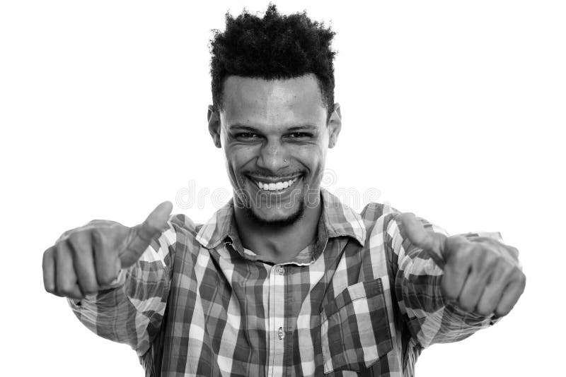 Young Happy African Man Smiling While Giving Thumbs Up Stock Image