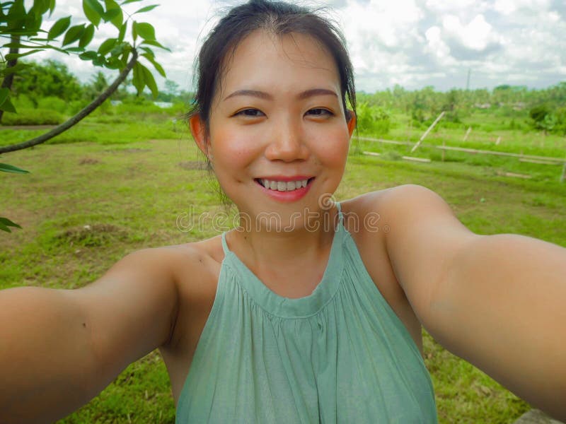 Young Happy And Attractive Asian Chinese Woman Taking Selfie Self