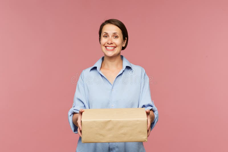 Young happy client of online shop with big packed box royalty free stock images Young happy client of online shop with big packed box royalty free stock images