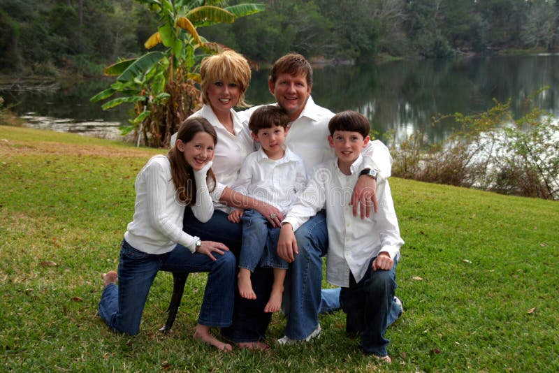 Young happy family of five