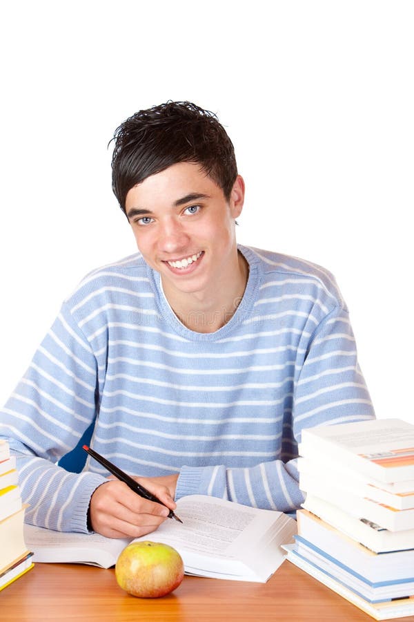 Young happy male student learning from study books