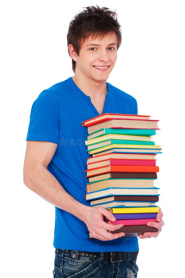 Young happy student with books.