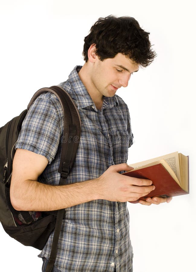 Young happy student carrying bag and books