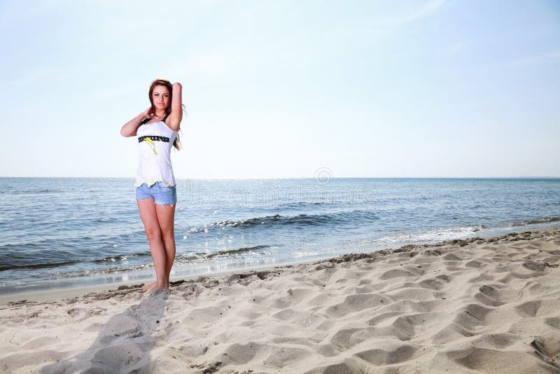 The Young Happy Woman on a Beach Stock Image - Image of grass, freedom ...