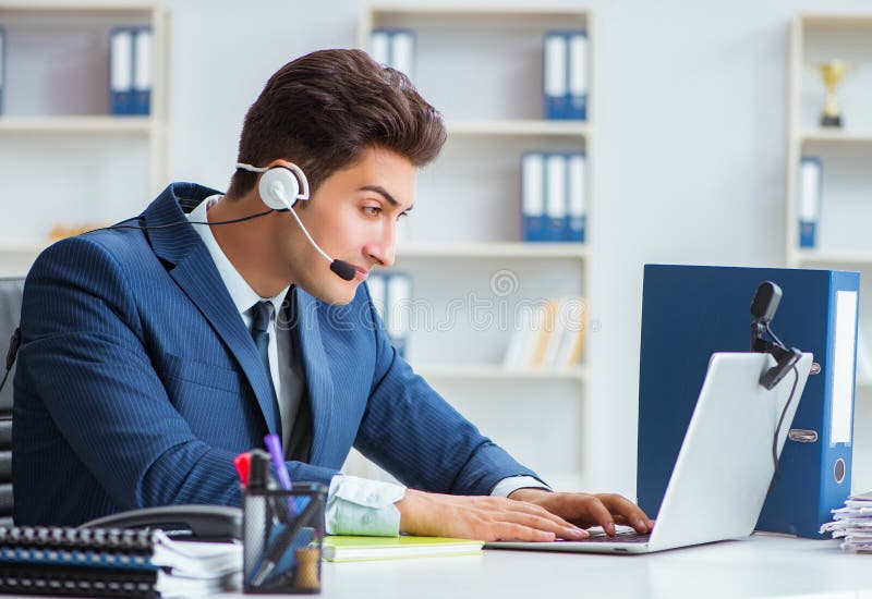Young Help Desk Operator Working In Office Stock Photo Image Of