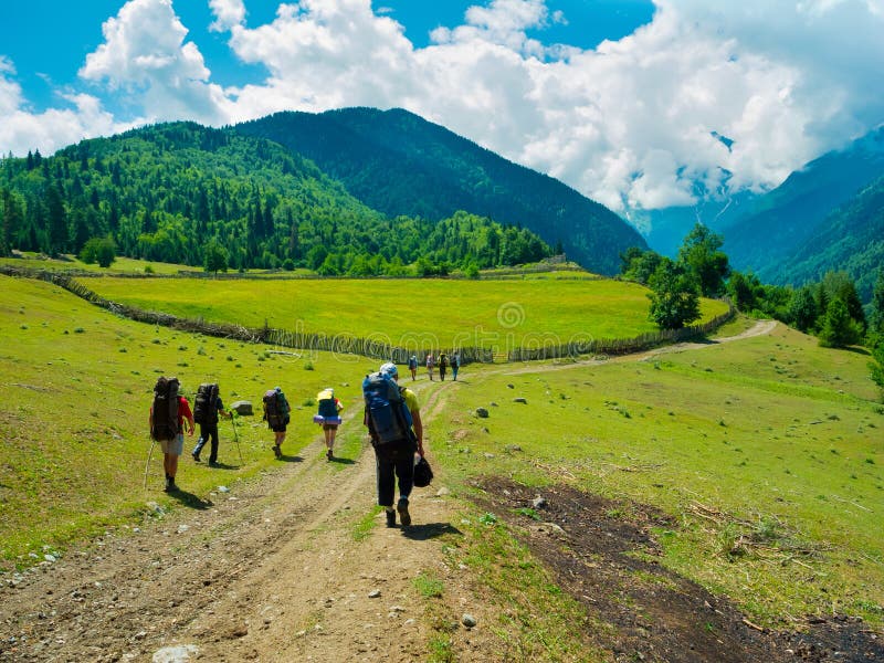 Young hikers trekking in Svaneti royalty free stock images