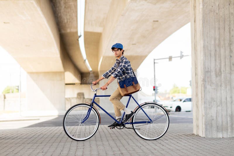 Young Hipster Man with Bag Riding Fixed Gear Bike Stock Photo - Image ...
