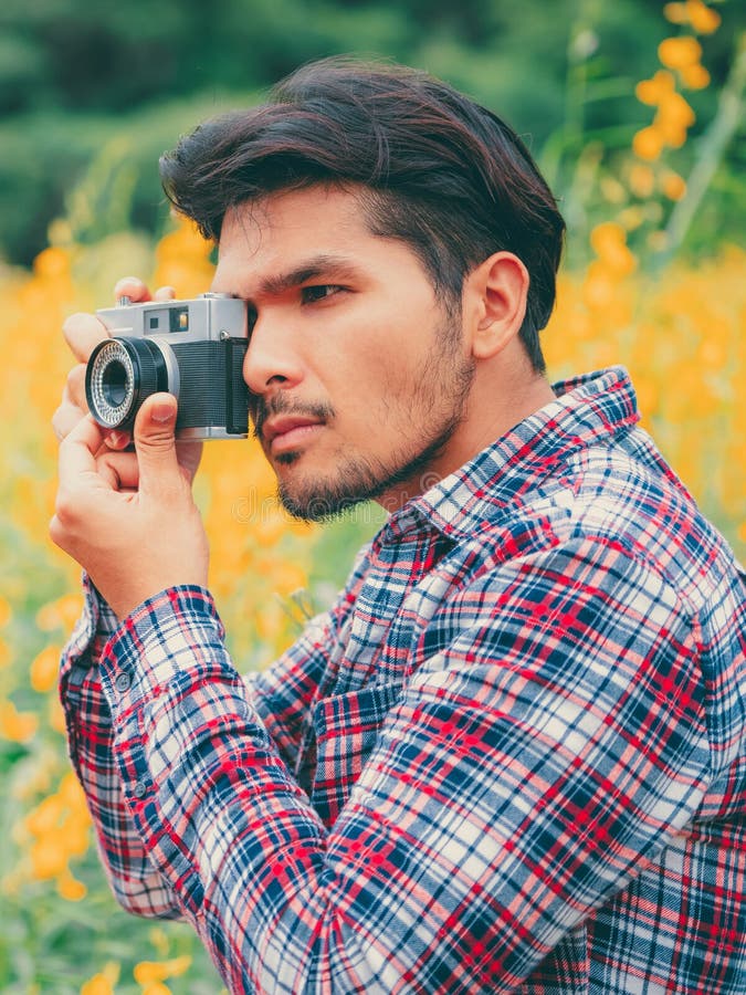 Handsome Boy Posing On The Camera On The Nature Background. Stock Photo,  Picture and Royalty Free Image. Image 88701290.