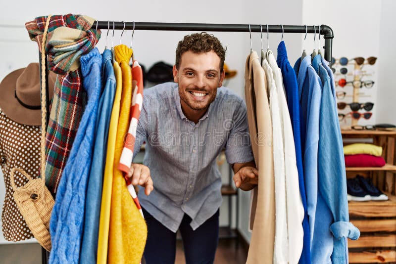 Young Hispanic Customer Man Smiling Happy Appearing through Clothes at ...
