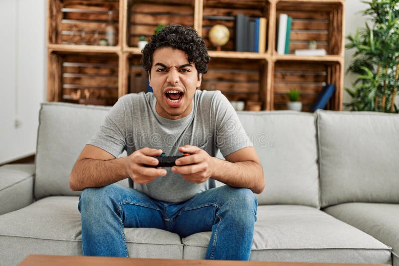 Man plays game seriously. stock image. Image of chat - 86505147