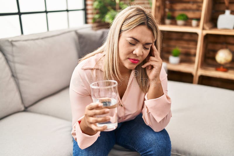 Young Hispanic Woman Suffering for Headache Drinking Water at Home Stock Image Image of
