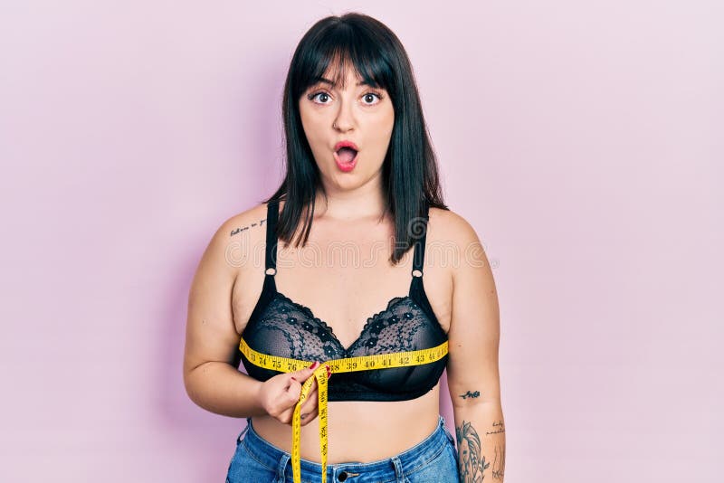 Young Hispanic Woman Using Tape Measure Measuring Breast Scared and Amazed  with Open Mouth for Surprise, Disbelief Face Stock Photo - Image of  excited, surprise: 227436576