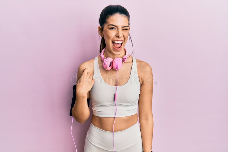 Photo of a Woman in Pink Activewear Looking at the Camera · Free Stock Photo