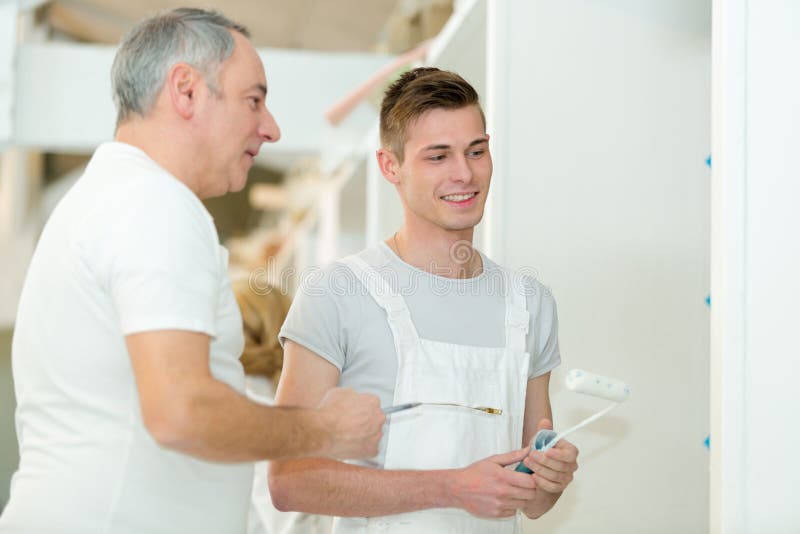 Young House Painters Apprentice with Mentor Stock Image Image of