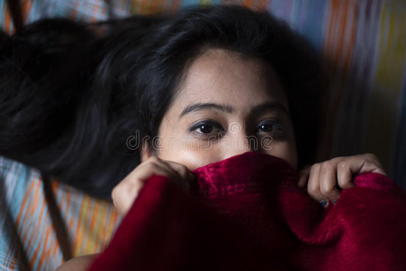 Young Indian Brunette Woman In Sleeping Wear Lying On A Bed Stock Image Image Of Beauty 