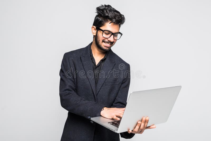 Young indian business man with laptop in hands isolated on white background