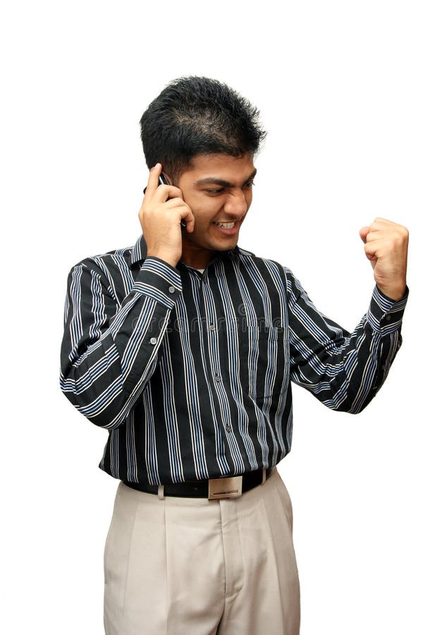 Young Indian business man using cellphone