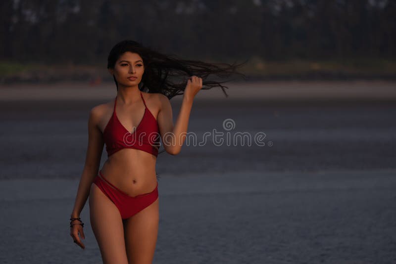 Deens desinfecteren Onderzoek Young Indian Girl in Red Bikini Enjoying Her Vacation on Beach and Relaxing  on Beach Stock Photo - Image of young, indian: 205707646