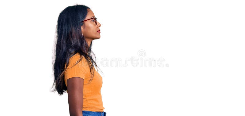 Young handsome man wearing casual t-shirt standing over isolated white  background looking to side, relax profile pose with natural face with  confident smile. Stock Photo | Adobe Stock