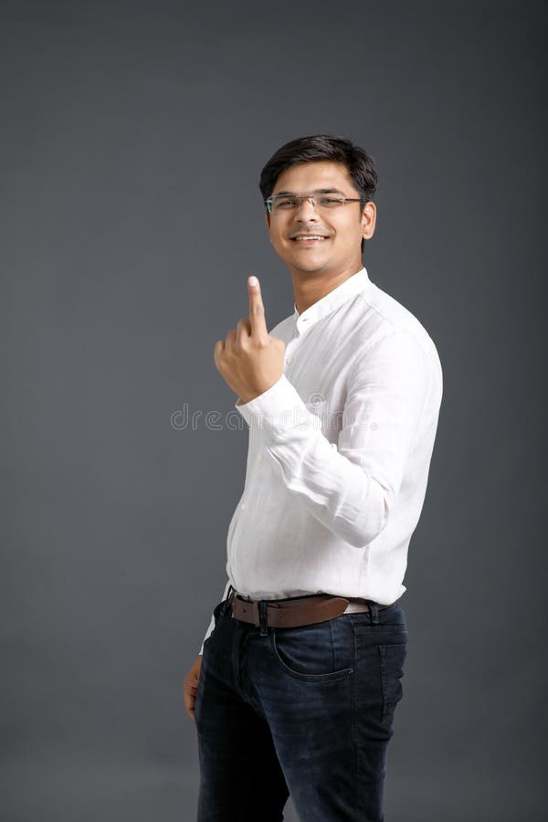 Young Indian voter showing finger , royalty free stock photo Young Indian voter showing finger , royalty free stock photo