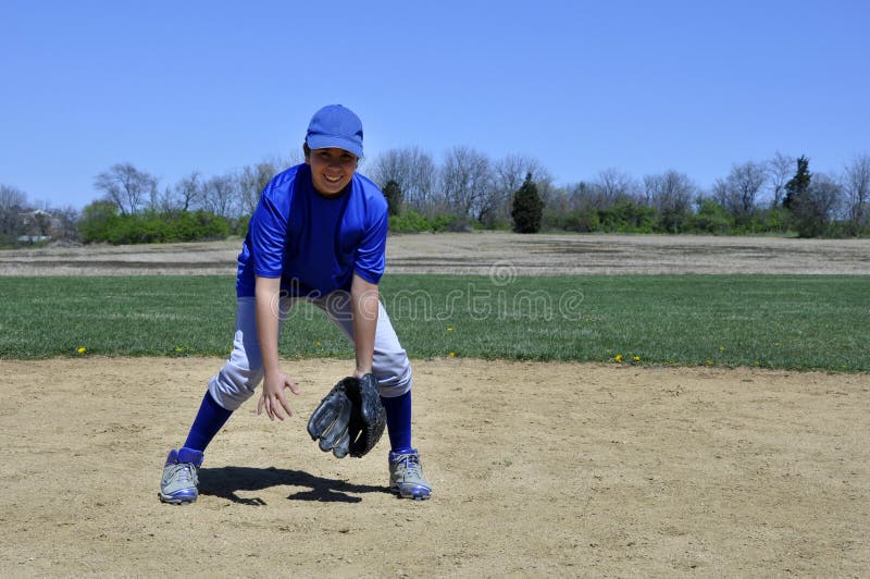 Young infield baseball player royalty free stock photo