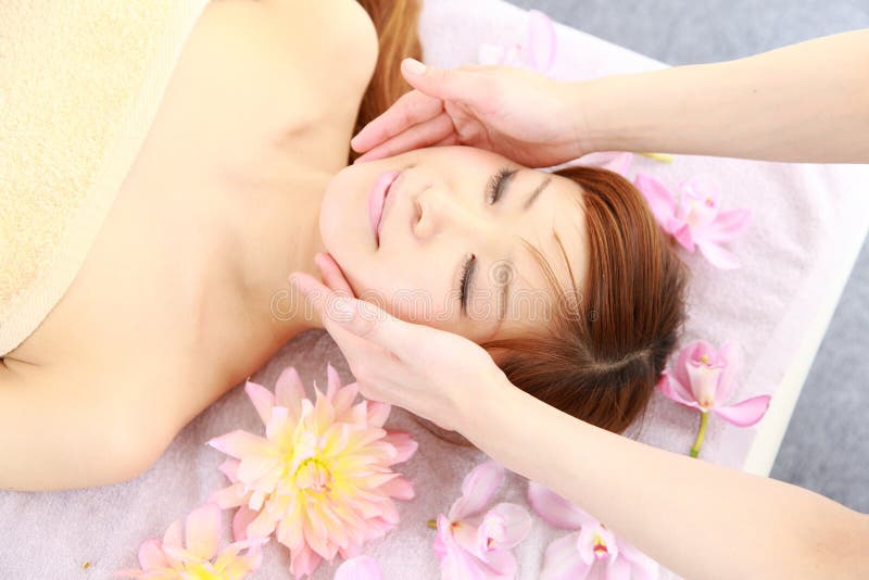 Young Japanese Woman Getting A Face Massage Stock Image Image Of
