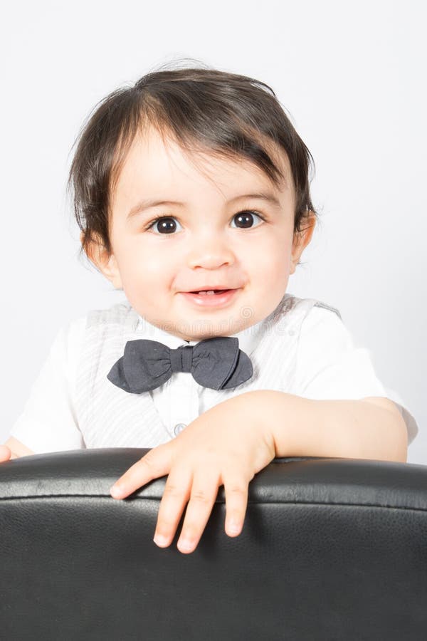 Young Kid Boy Standing Smiling on Desk Chair Stock Photo - Image of ...