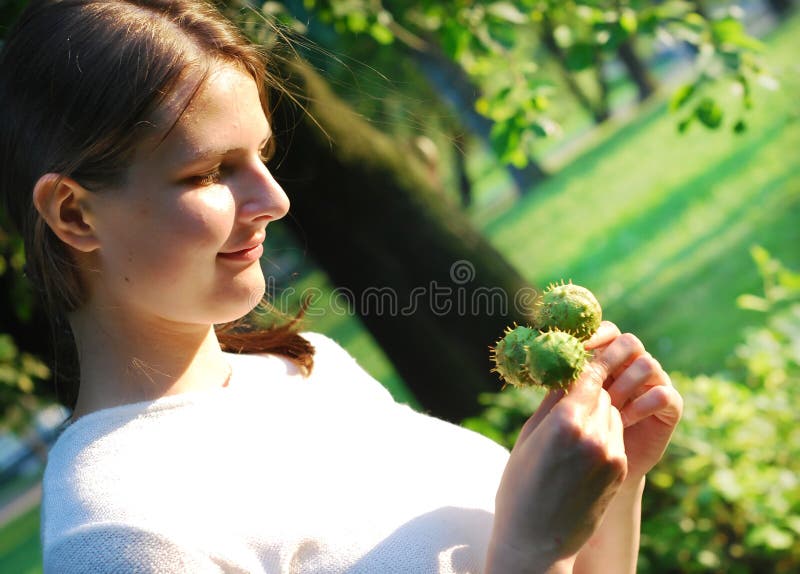 Young lady with chestnuts