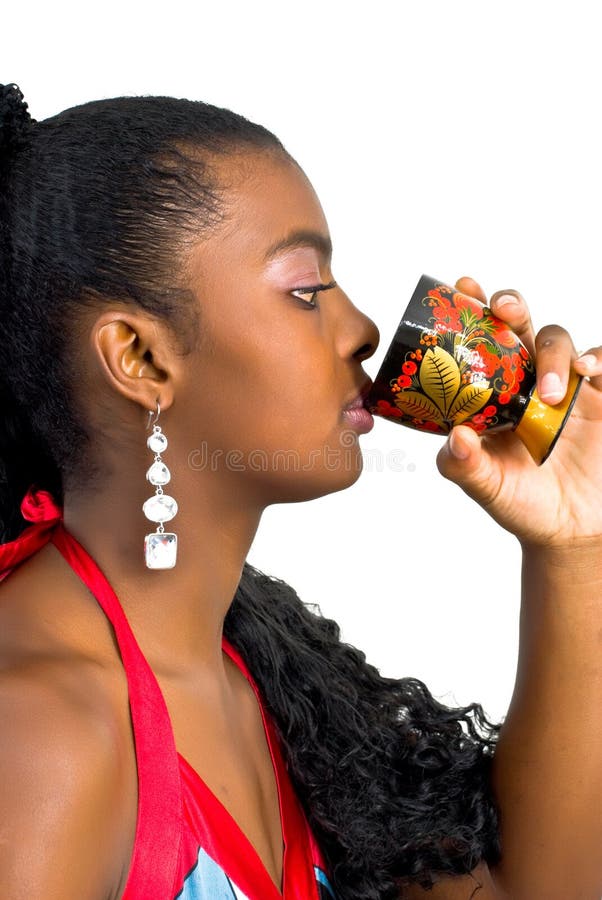 Young lady with a colorful wooden goblet