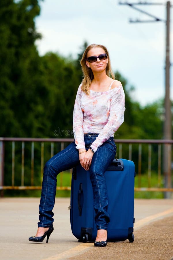 Young lady waiting a train