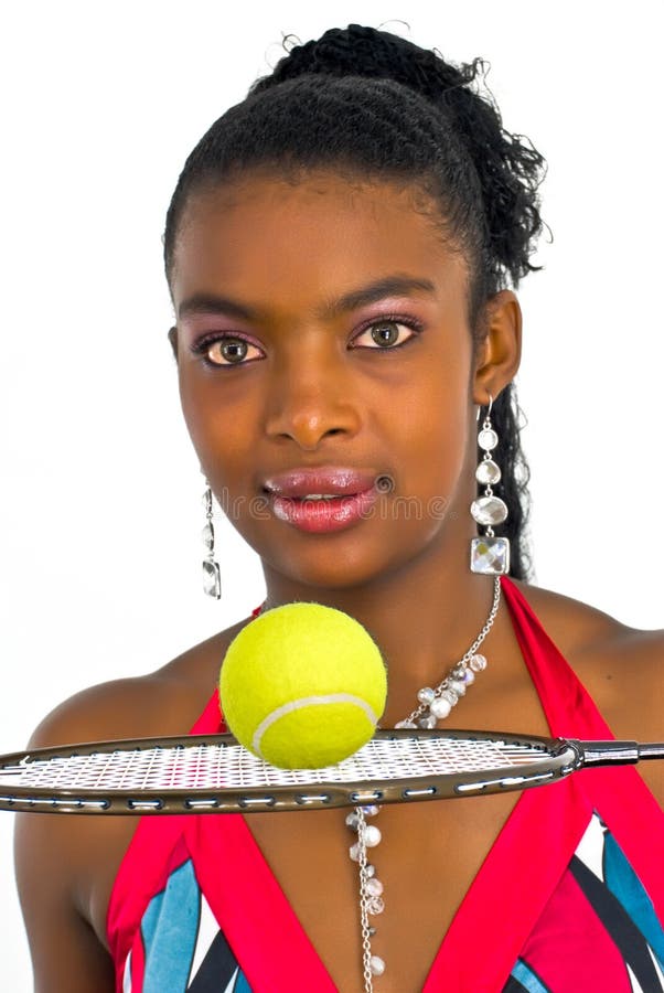 Young lady with a yellow tennis ball