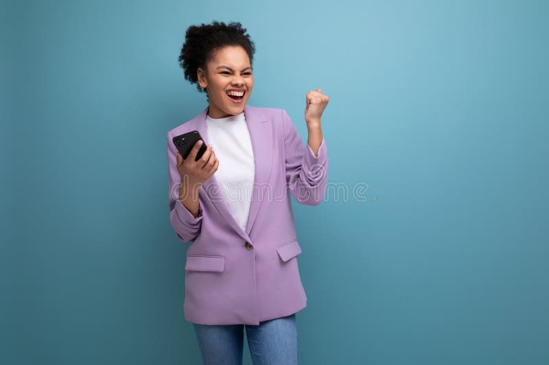 Young Latin Business Woman with a Ponytail Hairstyle Dressed in a ...