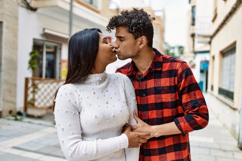 Young Latin Couple Kissing And Hugging At The City Stock Image Image